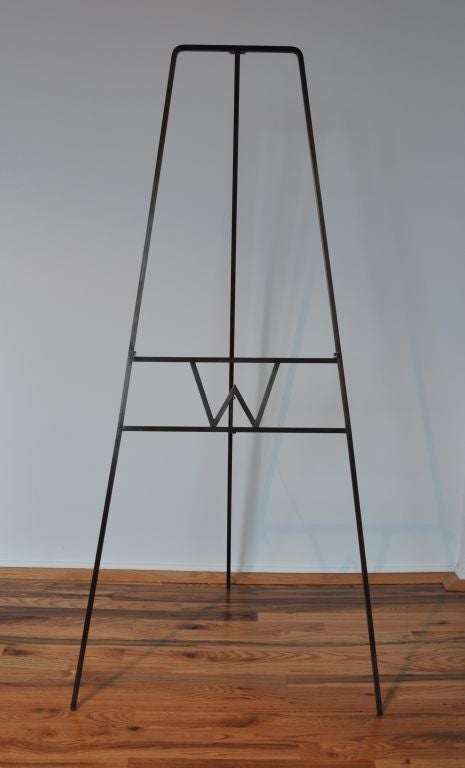 Easel in solid patinated brass. Two available, $1,900 each.