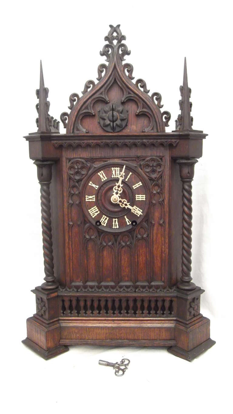 This is a VERY rare, antique (museum quality) Gothic cathedral bracket cuckoo clock, with a matching bracket 18