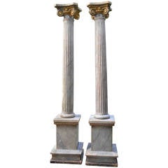 Pair of Wood Columns with Metal Capitals