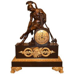 Restauration Period Patinated and Gilt Mantle Clock Featuring Wounded Soldier