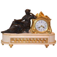 Louis XV style Patinated and Gilded Bronze Clock referred to as "a La Geoffrin", French Late 19th Century