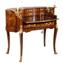 Rare marquetry French desk with gilded bronze candle holders