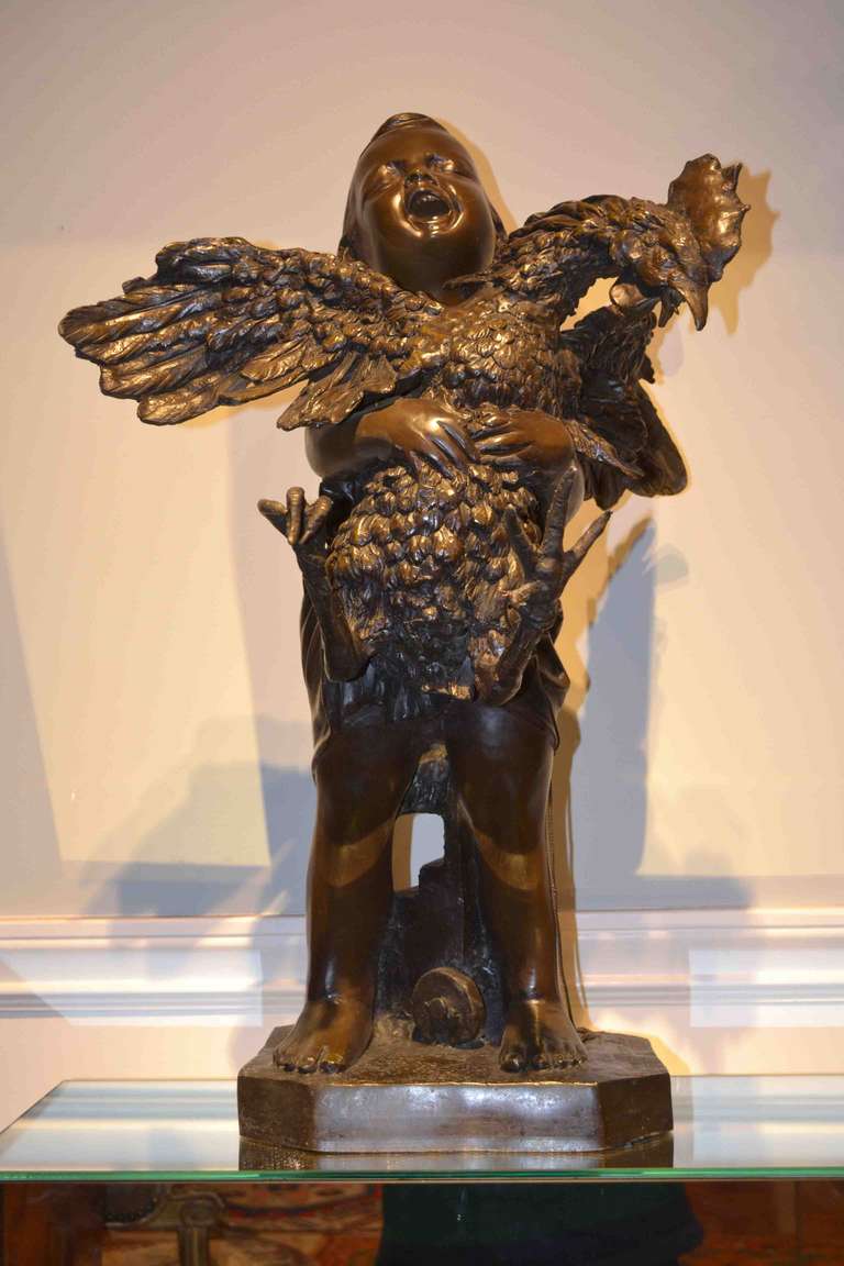 Very appealing subject matter showing a young boy at market holding a plump rooster for sale; signed at base.  Late 19th early 20th century casting of the original.

A chalk verison of the staue is at the Florence museum of Modern Art.  Copy in