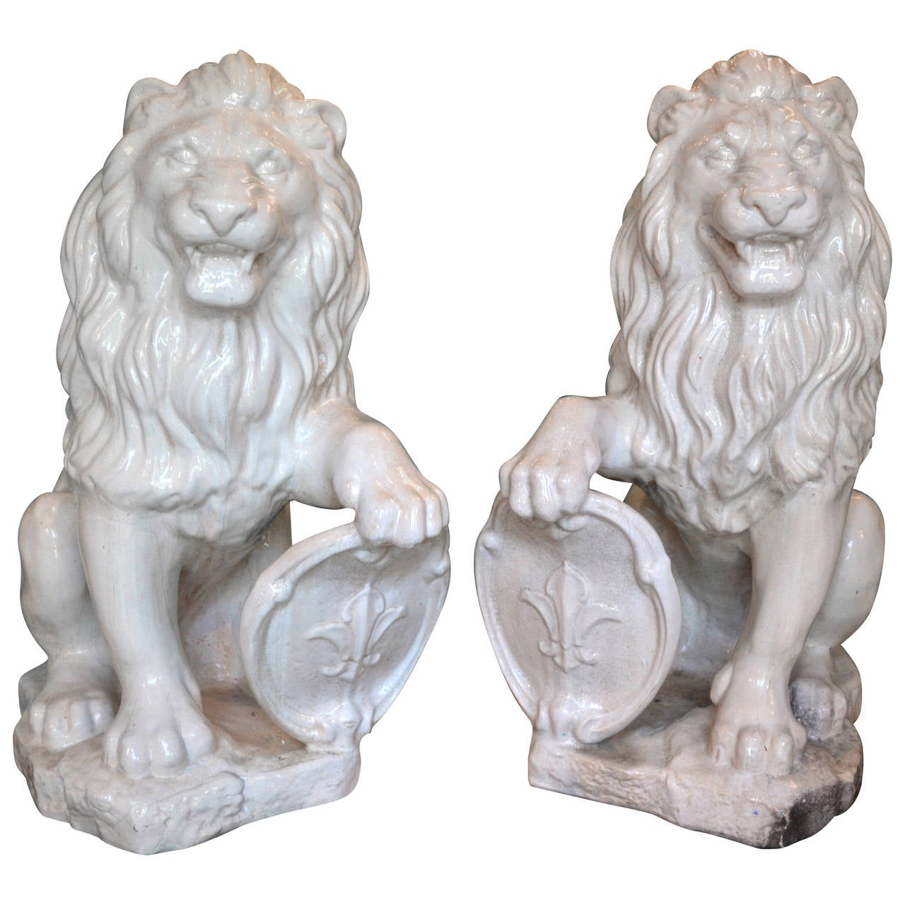 A large pair of glazed terracotta lions For Sale