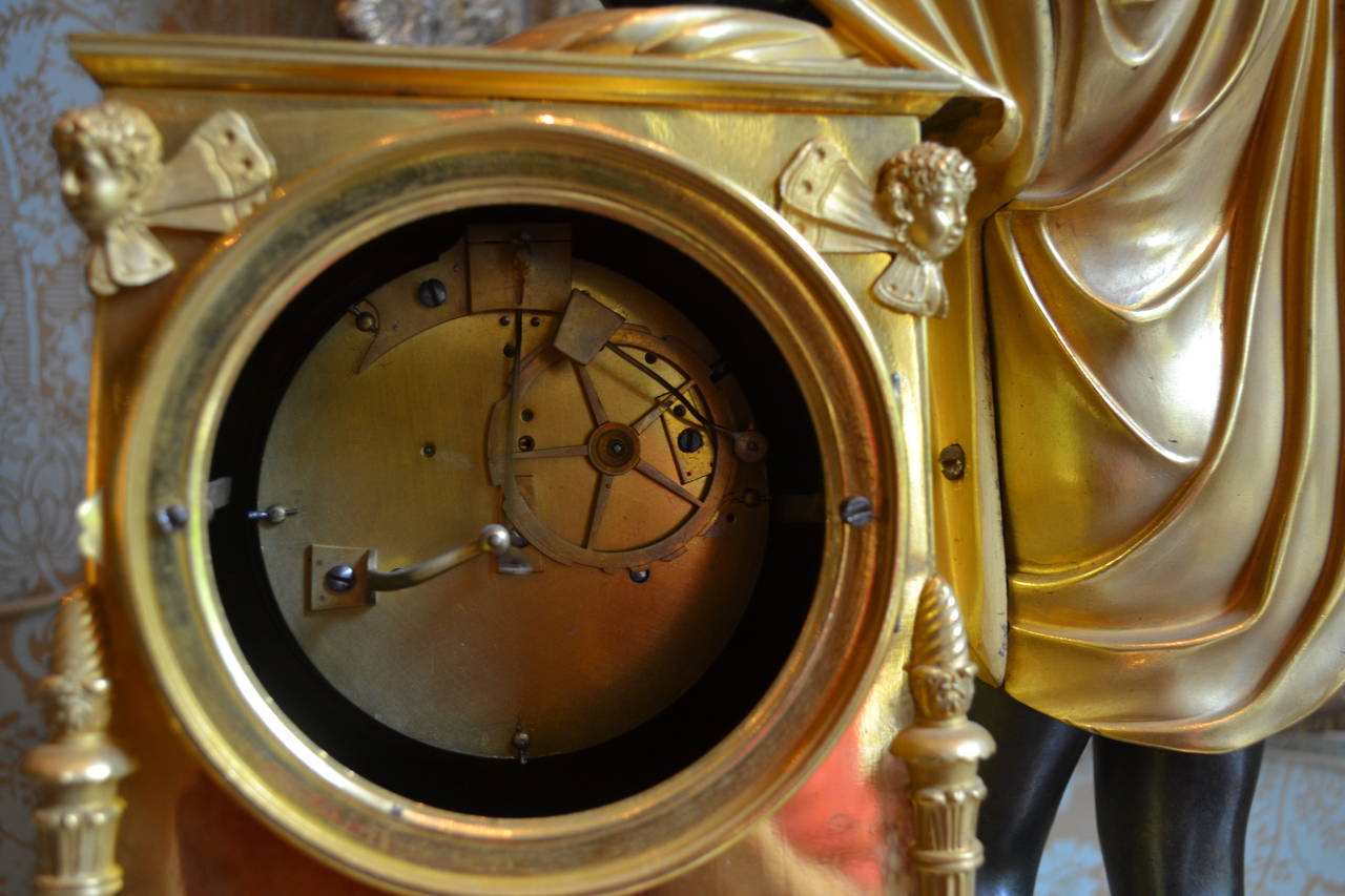19th Century Period Empire Clock Featuring a Standing Apollo, God of Music For Sale