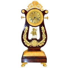 French Restauration Period Mahogany and Gilt Bronze Mantle Clock