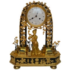 Antique Fine period French Empire mantle clock emblematic of gardening