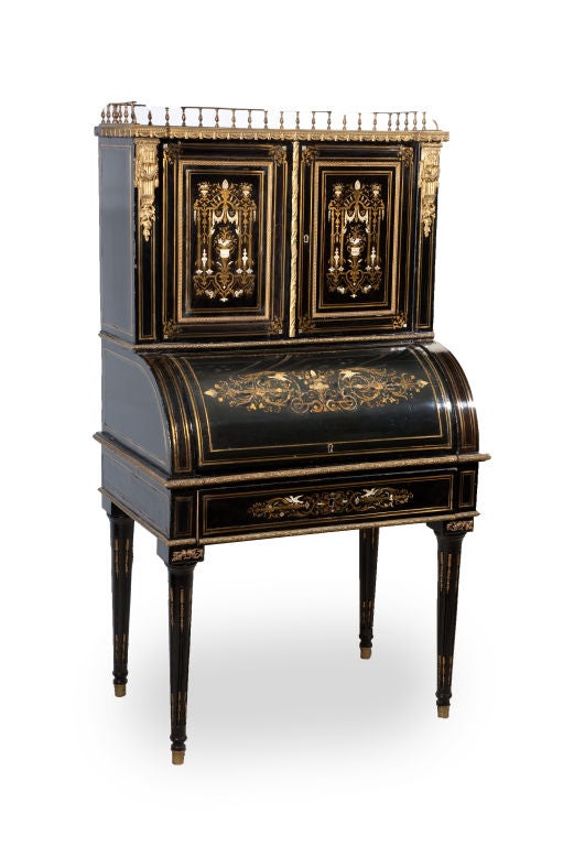 Napoleon III ebony roll-top antique desk with brass, bone, and mother of pearl inlay. Fitted lemon wood interior.