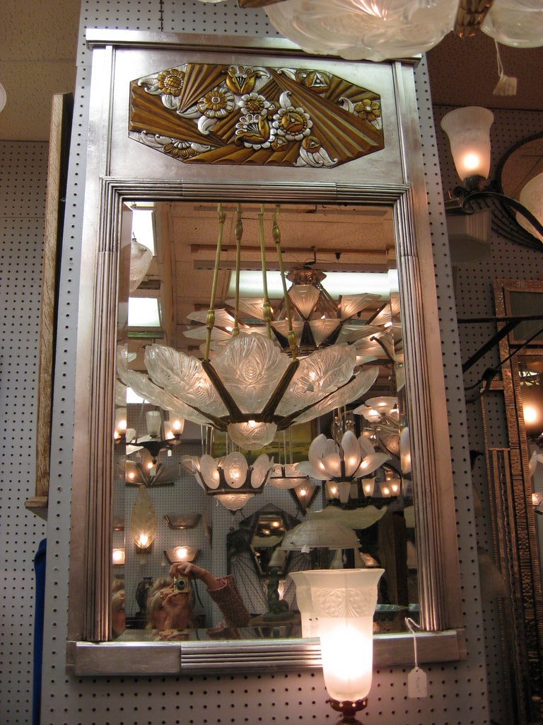 A Tall Art Deco gold and silver leaf mirror- France 1925