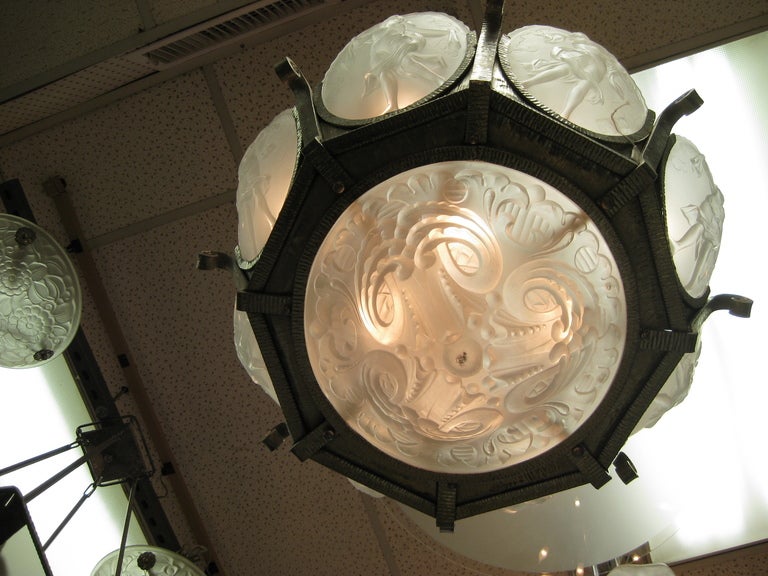 A Fine Art Deco colorless glass chandelier with dancing women- 1920's