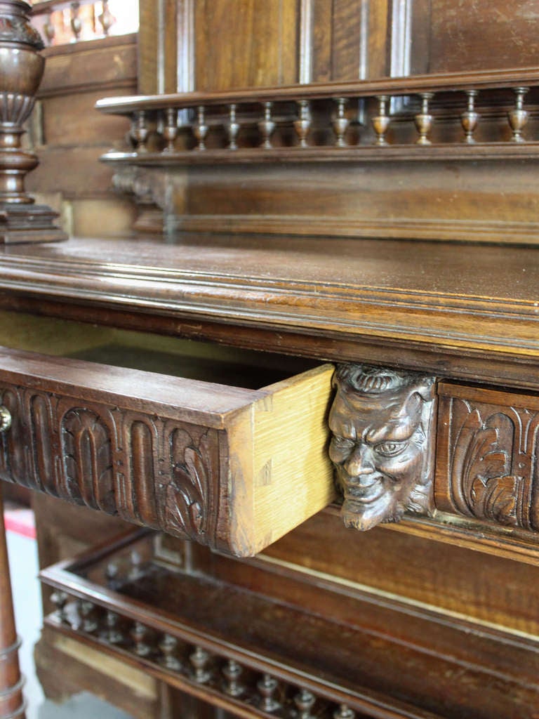 American Carved Walnut Figural Hutch For Sale