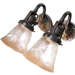 Pair of Sconces with Figural Faces