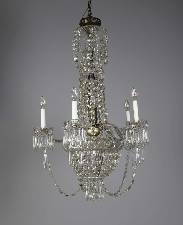 Circa. 1910 This beautifully proportioned Baccarat white crystal chandelier was removed from a CPR home in Vancouver's prestigious 1st Shaughnessy neighbourhood. This light retains all of it's original crystals it is displayed in found condition but