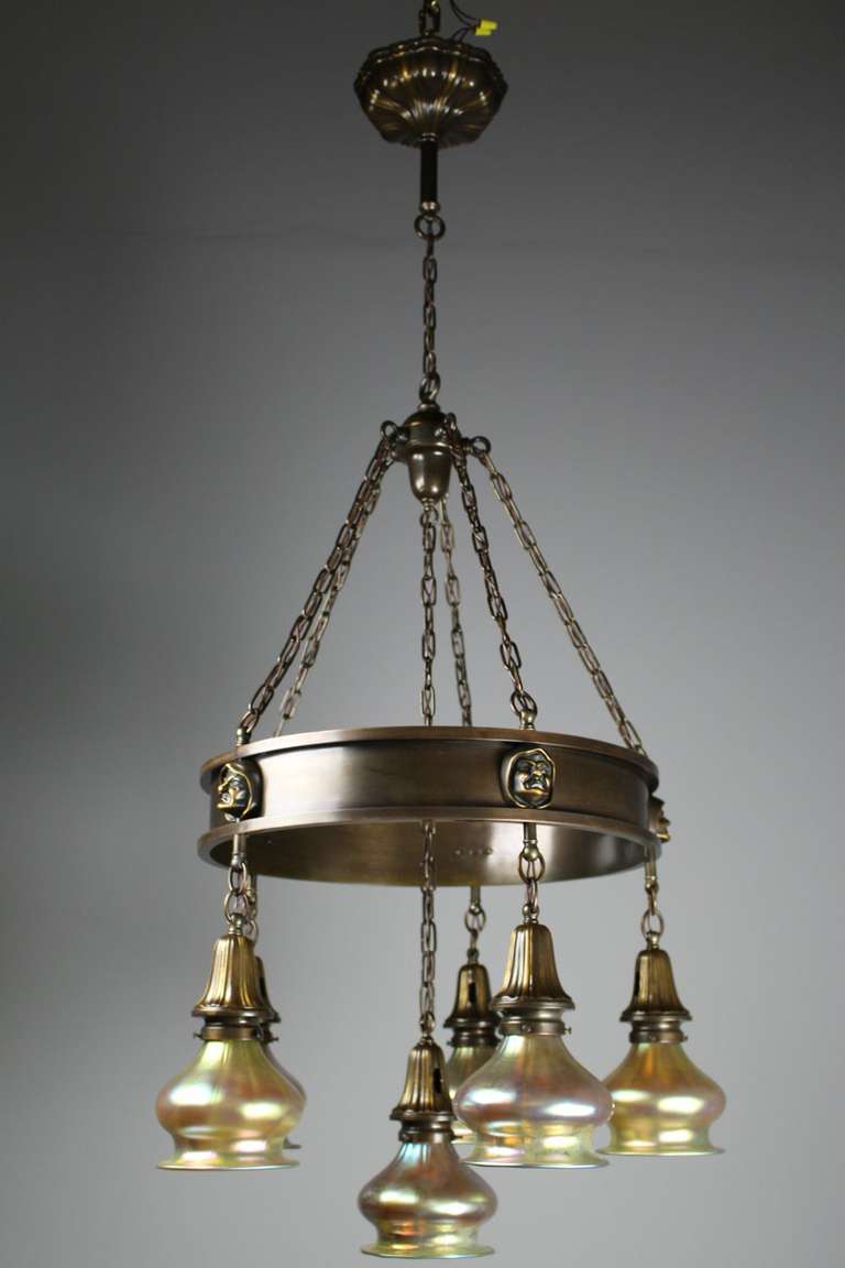 An elegant yet fun figural fixture, depicting character filled 