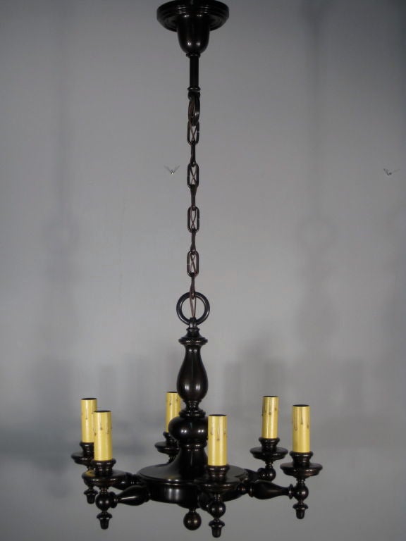 Colonial revival brass chandelier, circa 1915. Restored antique brass finish, manufactured by 'Beardslee' of Chicago. Fixture is all original with manufacturer's mark on canopy.
Measurements: 41