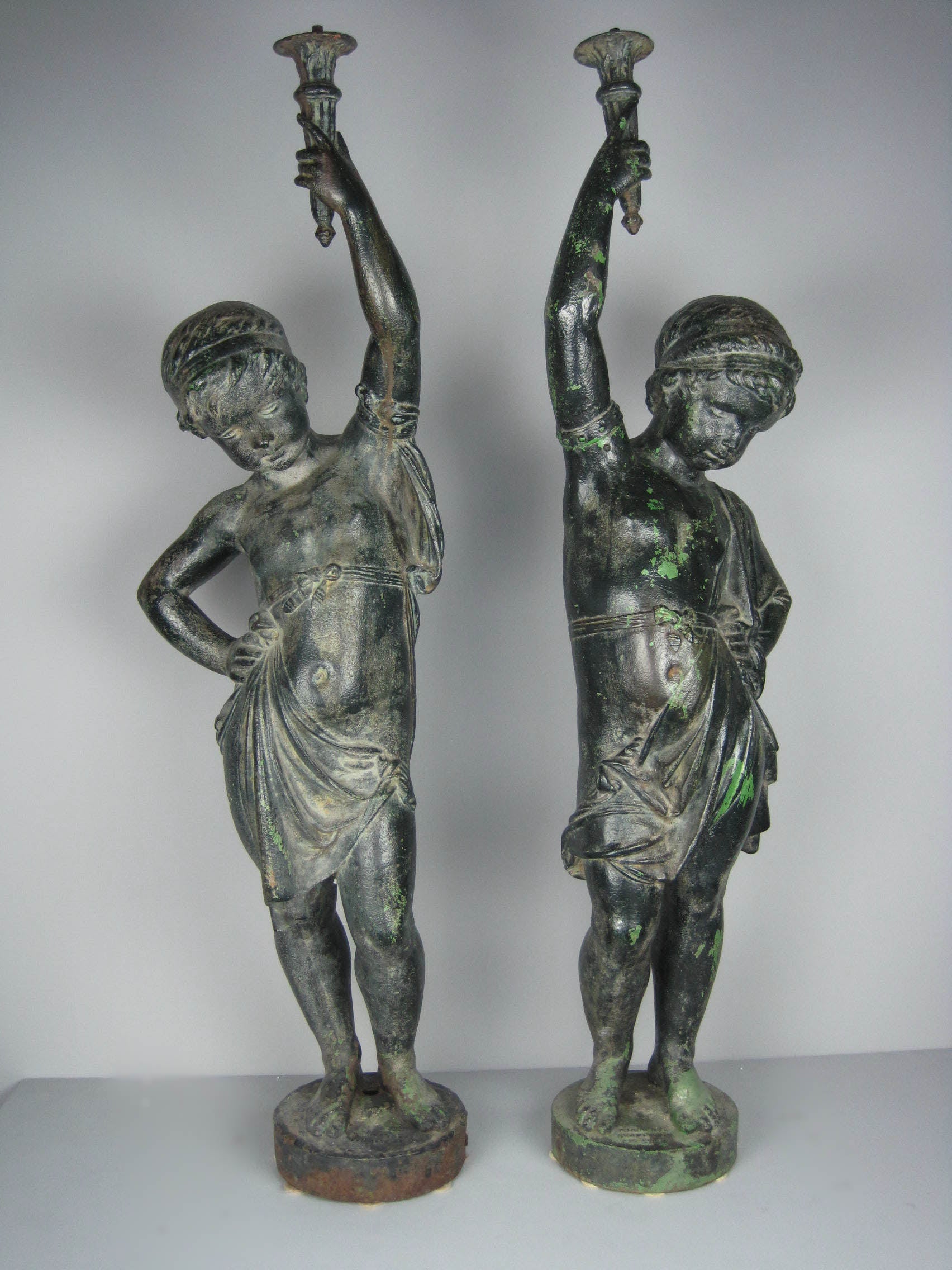 ANTOINE DURENNE Matched French Cast Iron Cupid For Sale