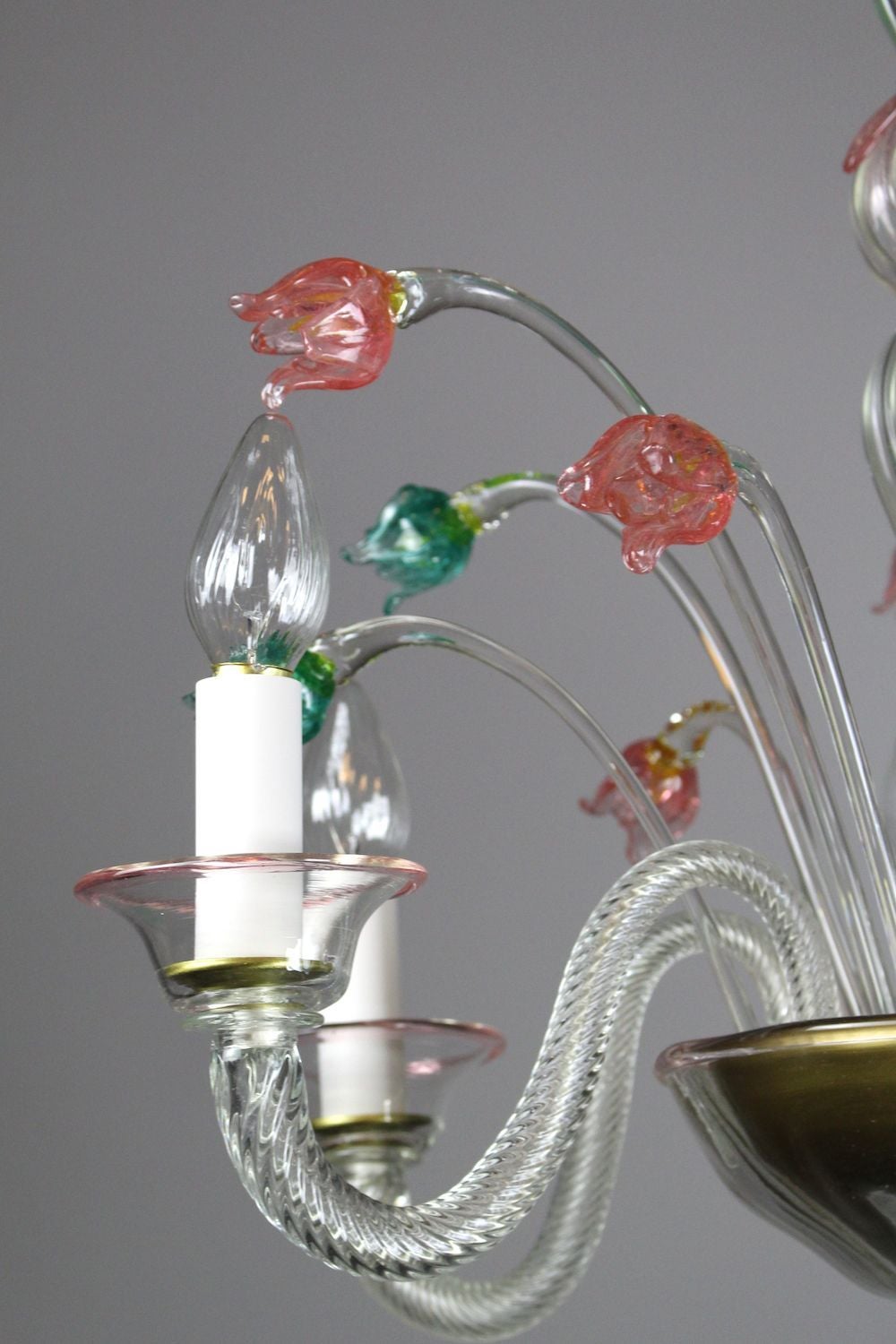 Circa 1955 Rare Murano Ca'rezzonico chandelier in transparent and multi-colour glass. This piece is an absolute collector's dream. Fully restored to its original condition, rewired, and ready to hang. The upper bouquet of the chandelier is composed