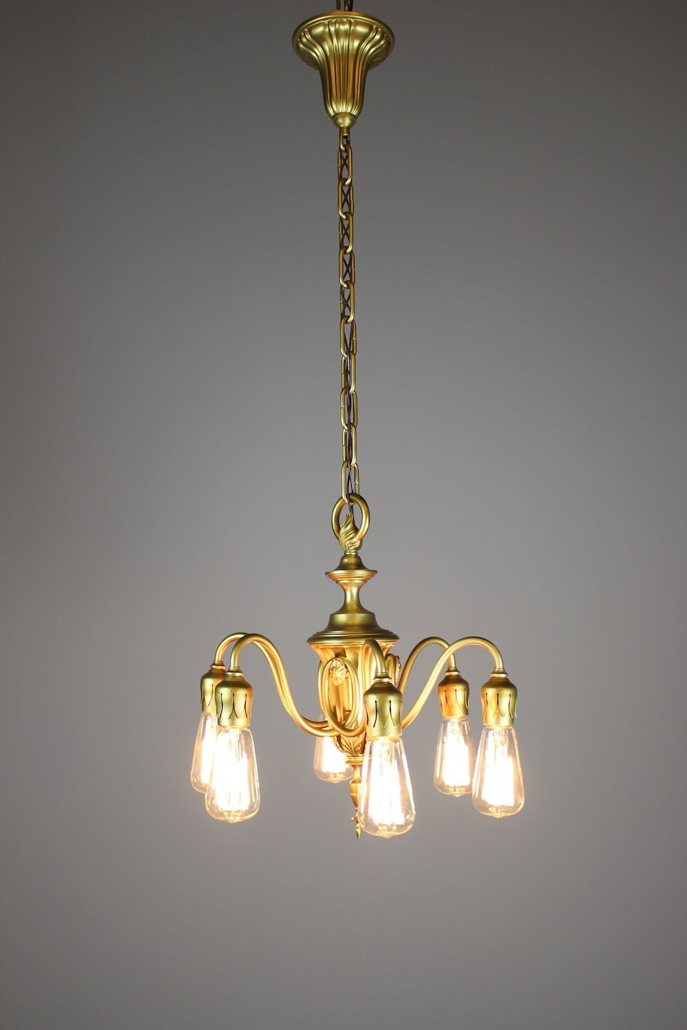 Circa 1925. Lovely Adam Style Bare Bulb Fixture by R. Williamson & Co of Chicago (6-Light) Retains original gilt finish. This light has been cleaned, rewired, and restored. Ready to hang. 
DF1231 Measurements 40"H x 16"W