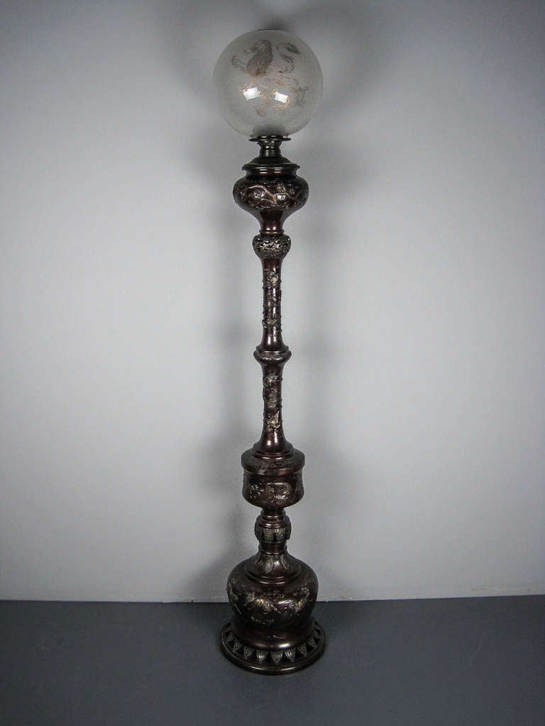 Ca. 1880 Oil lamp profusely decorated cranes, doves and mythical beasts. Original Baccarat etched shade.
Measurements: 79"H x 14"Dia. SKU: TL1000