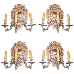Four Ornate Brass Sconces