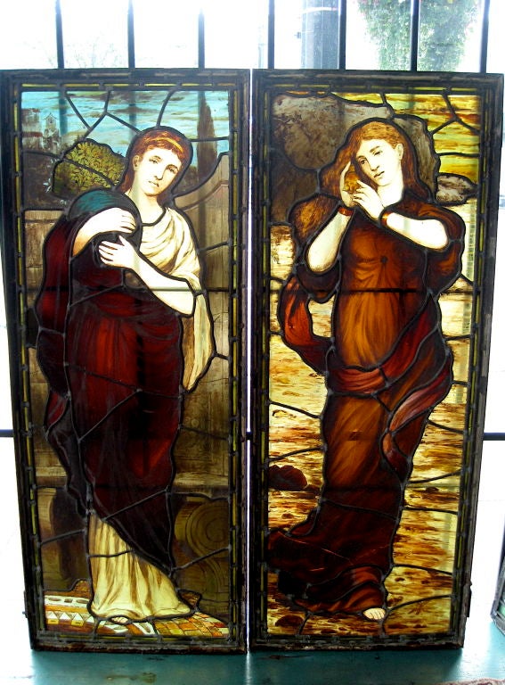 A stunning pair of late 19th century stained glass windows in the Aesthetic Pre-Raphaelite style. Found in New York. Attributed to Daniel Cottier.

Daniel Cottier (1837-1891) was an artist and designer born in Anderston, Glasgow, Scotland. His