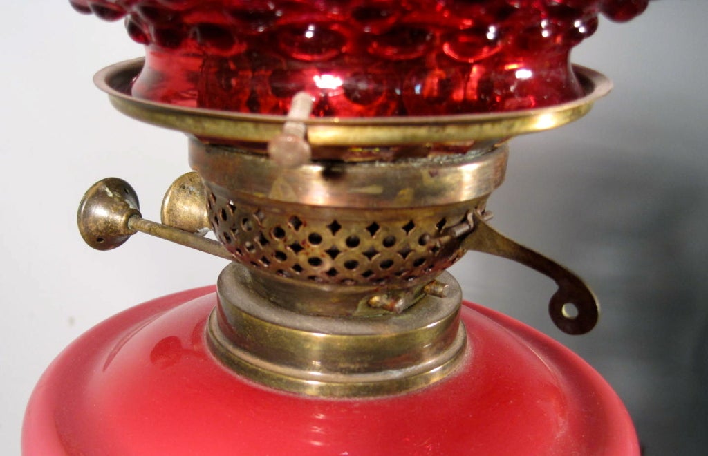 Brass Cranberry Kerosene Table Lamp For Sale