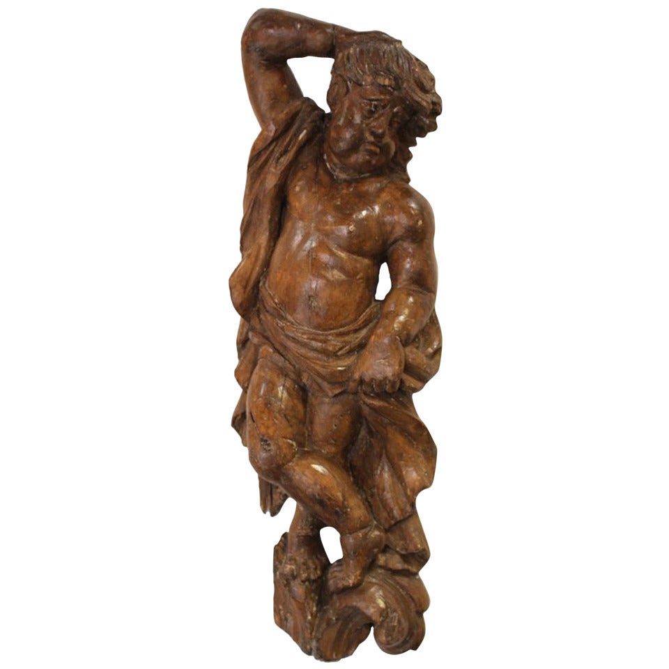 18th Century Carved and Waxed Pine Carving of Putto For Sale