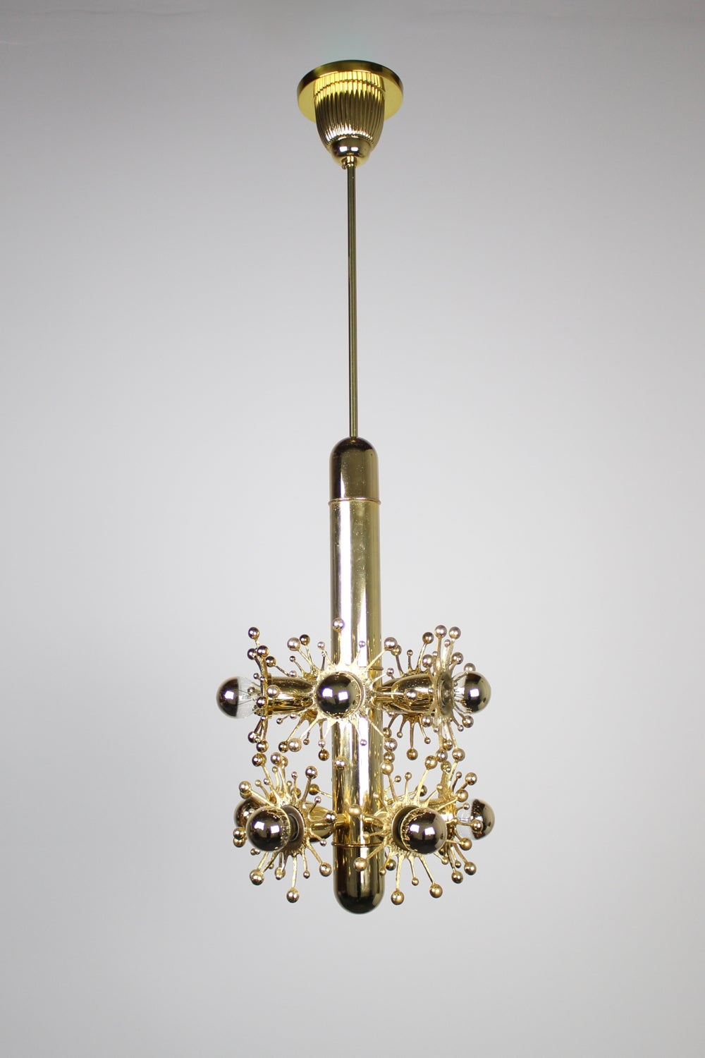 Super cool and beautifully made Mid-Century gold Sputnik pendant light fixture in the 