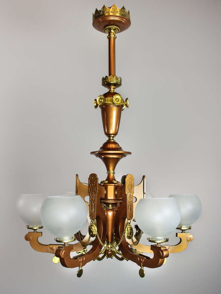 Ca. 1875 Monumental six-arm speltre fixture made by "Mitchell, Vance & Co." of New York. This unusual fixture is all original and finished in the period cinnamon bronze and fitted with medallions of Robin Hood and Maid Marion.
A lone