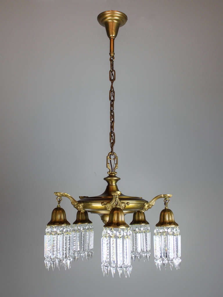 Ca. 1915 Antique pan light fixture with exceptionally detailed heavy-cast arms fitted with patterned crystal embellished bells. A wonderful quality example of the period, restored original finish, rewired and ready to hang. 19