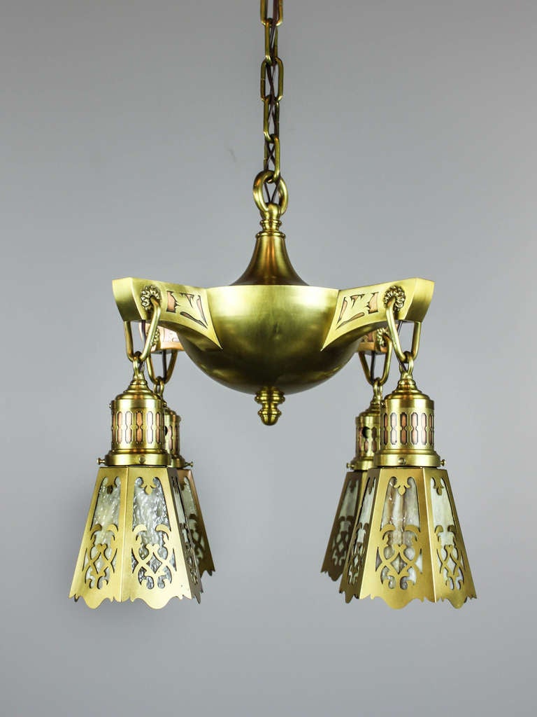 Ca. 1910 A stunning antique light fixture with Art Nouveau floral patterned arms. Finished in the original, luminescent antique brass and decorated with flora castings. A quality fixture fully restored and re-wired, fitted with antique caramel slag