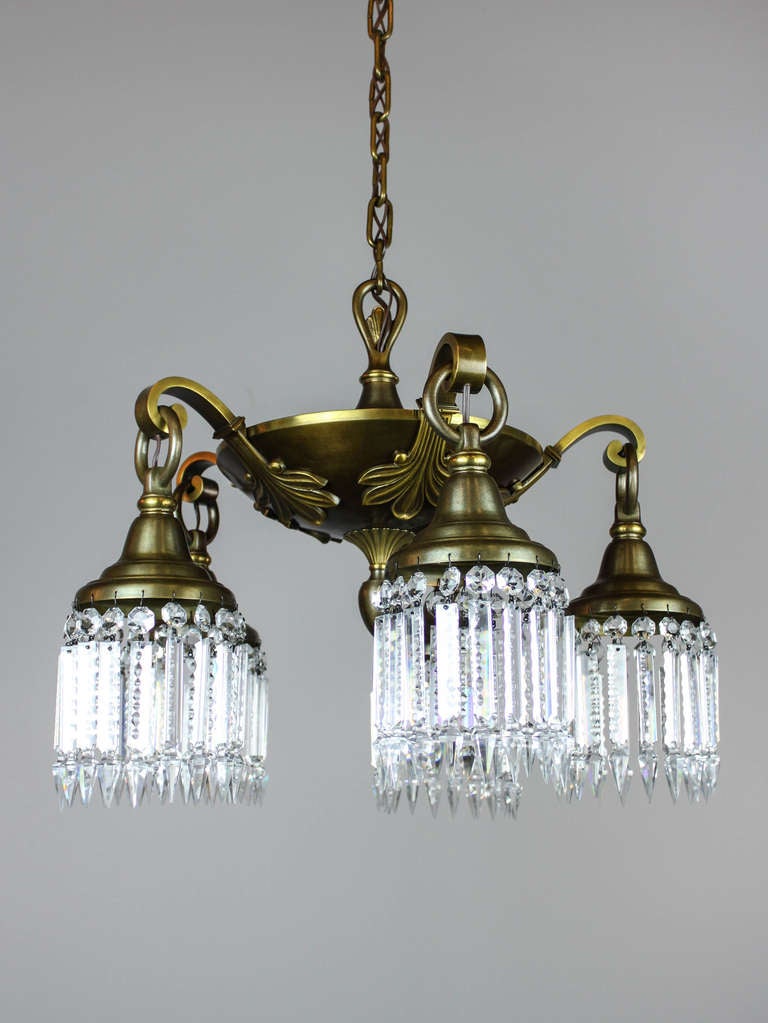 Ca. 1915 Edwardian pan light with heavy cast curled arms and decorative foliate motif. Fitted with notched crystal bell holders and finished in a period-correct olive bronze. Rewired and ready to hang in your dining room or entrance way. 19