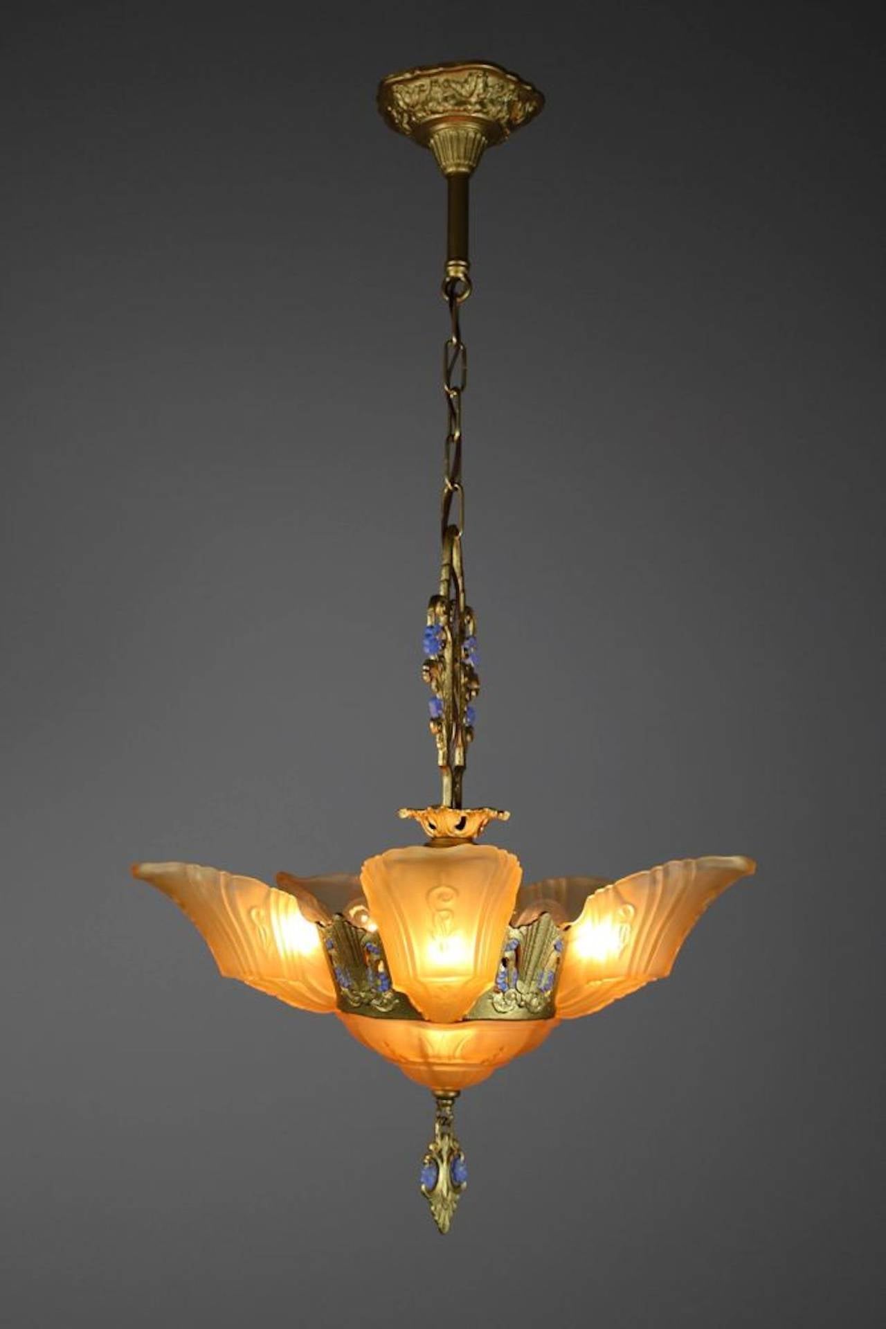 Fantastic original Art Deco slip shade chandelier, circa 1920 with powder blue floral motif. This lovely light came out of a heritage home in Ontario, Canada. It has been newly restored, rewired, and is ready to hang. 

Measurements: 39
