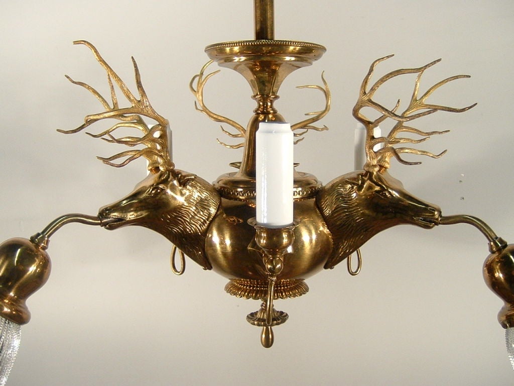 Very unusual fixture with Elk's heads, made by Beardslee of Chicago, c. 1910. Originally the fixture had 3 arms electric and three gas, These fixtures were designed for Elk's Club Lodges and found in chalets, hunting lodges and homes. Highest