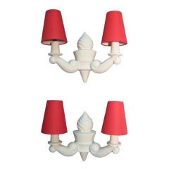 Pairs of sconces by Arlus