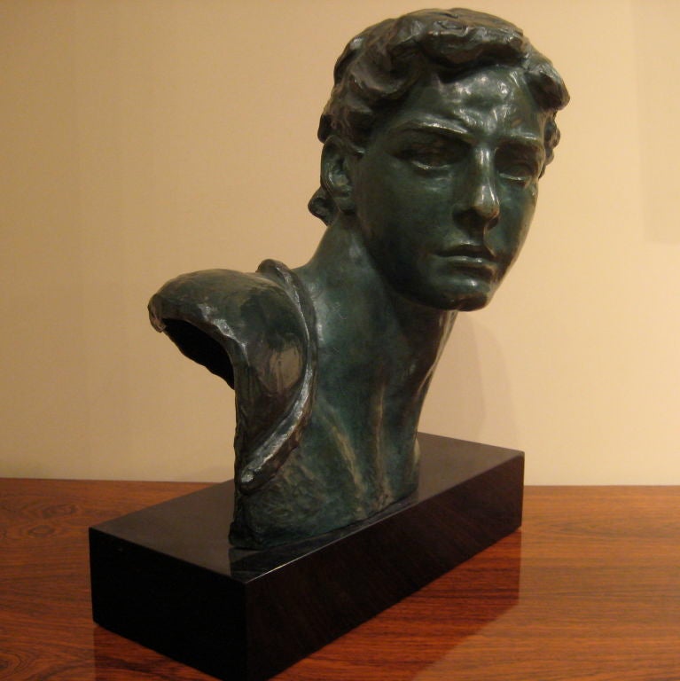A handsome bust of a young male by well know Deco sculptor Alexandre Kelety<br />
In Bronze on basalt base.<br />
Signed and foundry stamp
