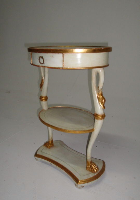 Swedish Biedermeier side table with swan head legs and lions paw foot, single drawer and shelf.