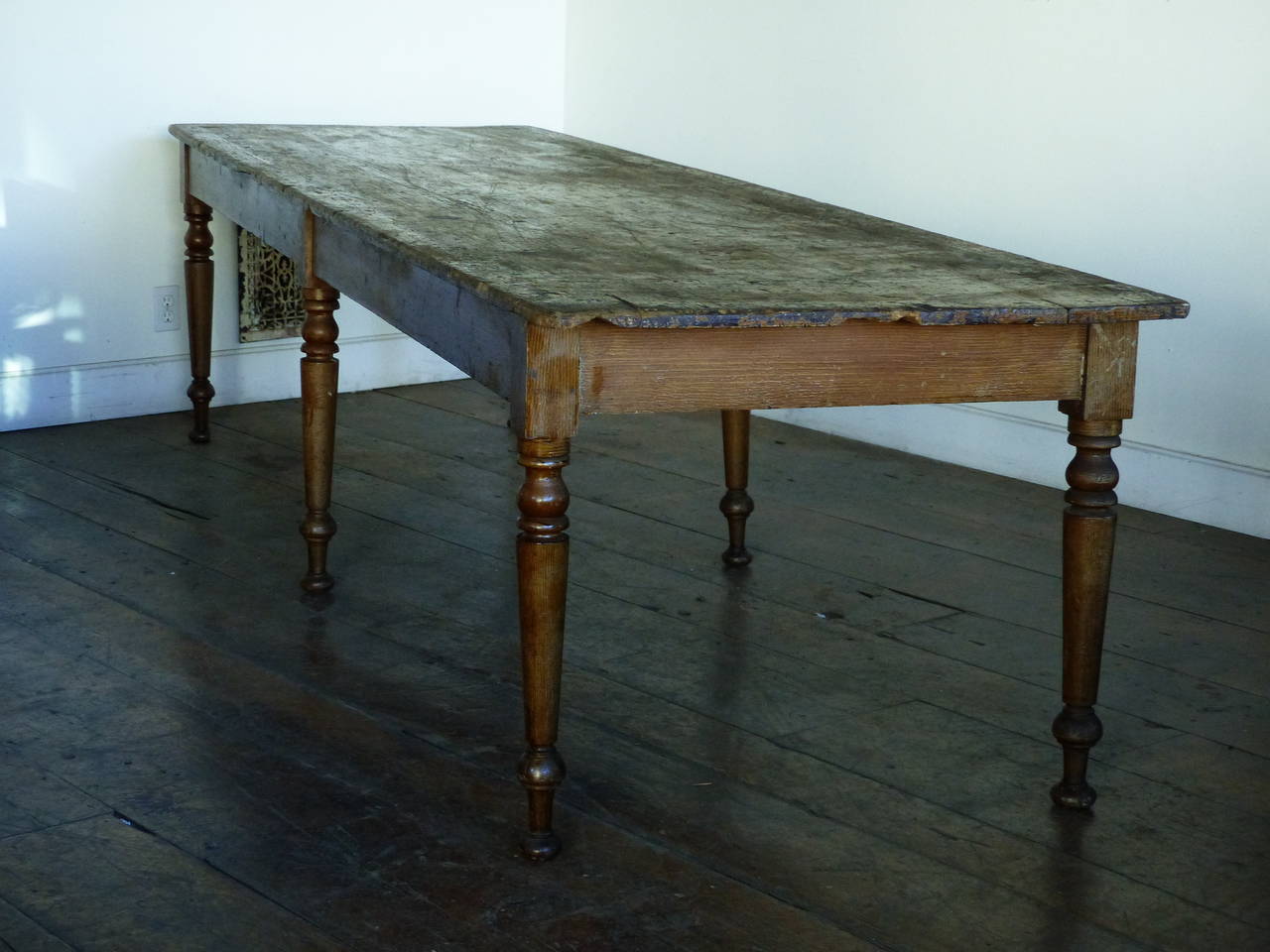 Rare six leg 10 foot harvest table with original grain finish on top and legs. Quebec. No drawers. Square nailed construction with good clearance from skirt to floor .