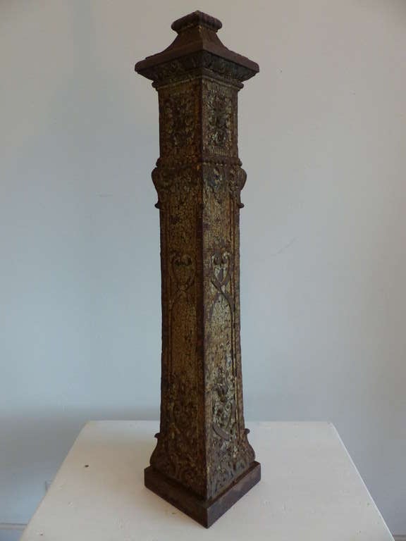 Newel posts in cast iron with original untouched surface paint. Heavy detail and decoration
