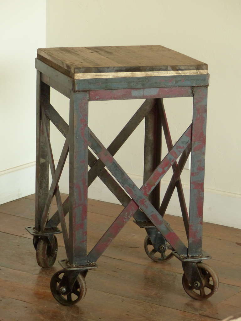 Steel industrial cart with maple wood top, can be used as a work station or kitchen island