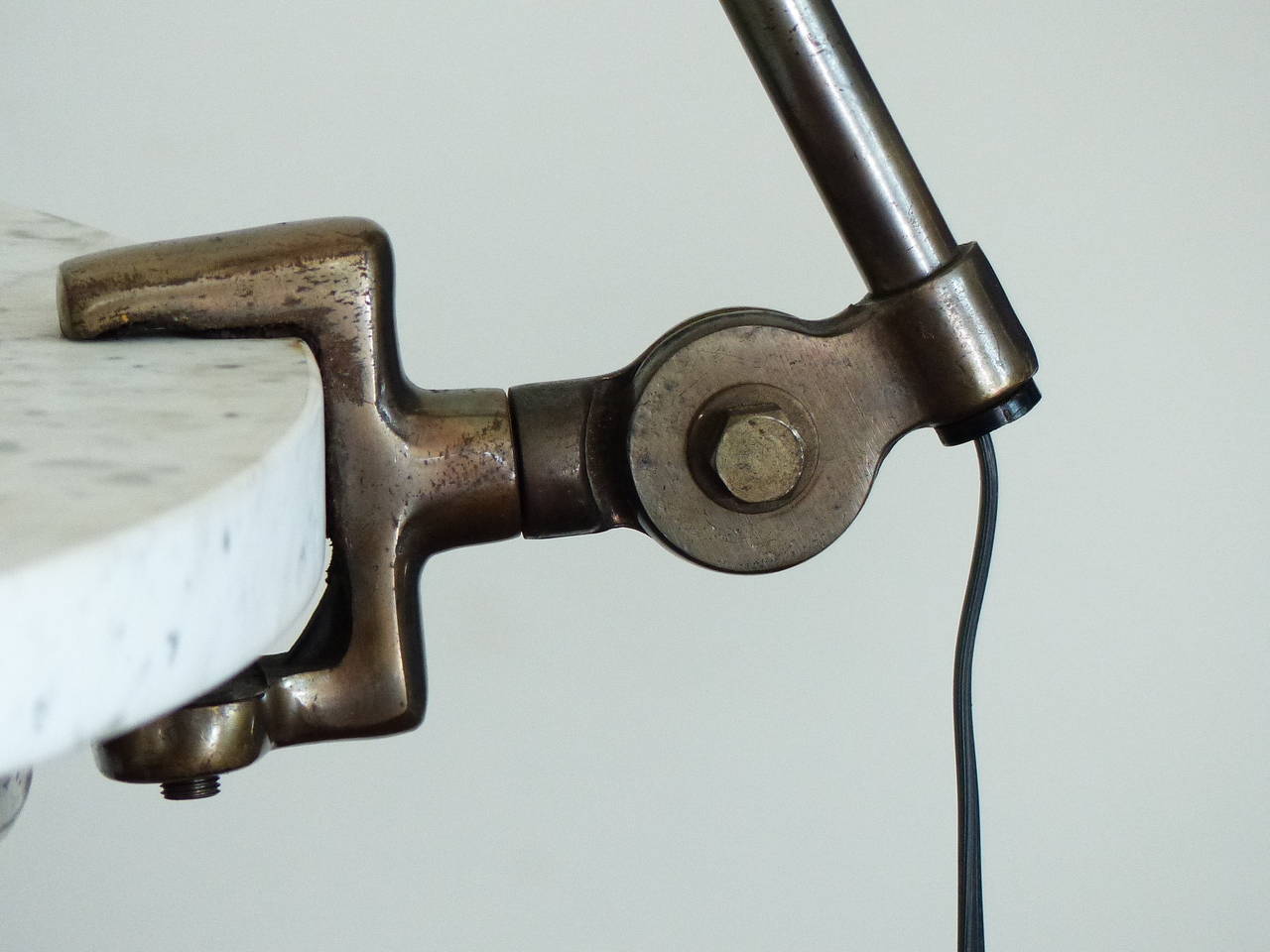 Clip-on Micron desk lamp with original deep patina. Re-wired and restored. Found in NYC