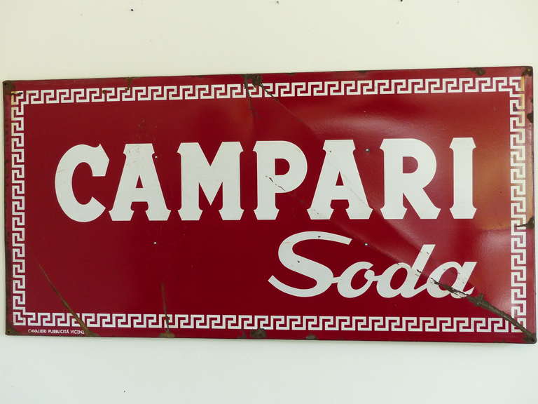 Enamel sign on steel with  wood back