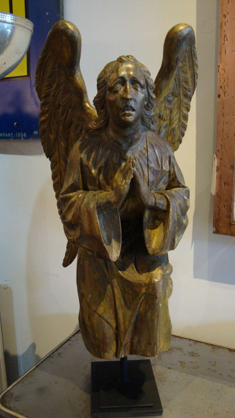 Carved, wood angel. Traces of gilding on wood surface. Great detail and emotion in a smaller size…...