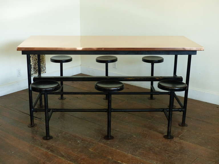 Six seater flip seat table, with metal top seats and copper top