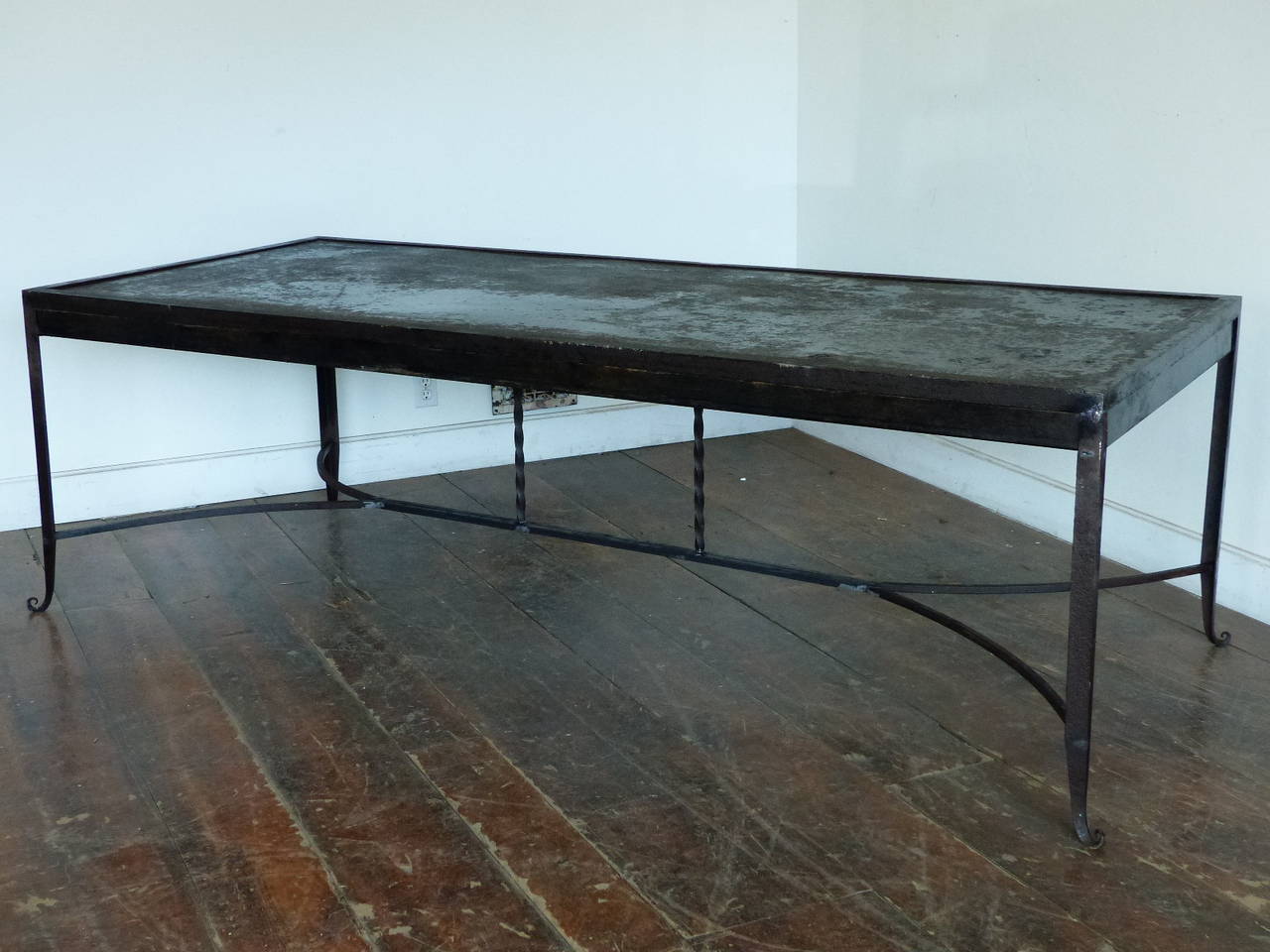 Great handmade french outdoor iron table  with hammered forged feet  and old rusty sealed finish.
Can be used indoor or outdoor. 96x 40