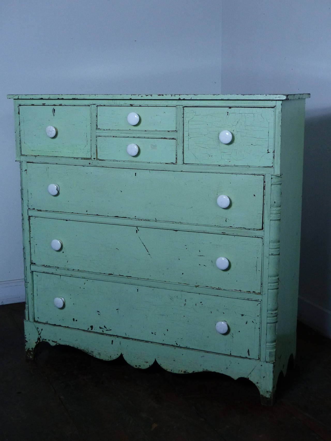 Recently acquired chest of drawers from Nova Scotia with age cracked polychromatic paint over an old original cream colored surface. The primary wood is butternut with inlay details and secondary wood being white pine. The chest is very solid with a