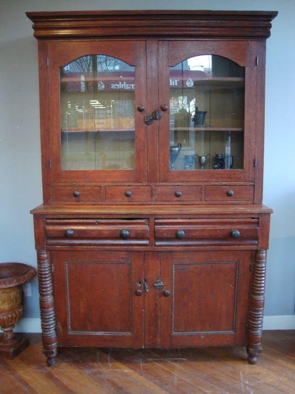 Ontario cupboard in first paint , over sized with multi drawer configuration. This is a nice rare example of a Canadian (formal) country piece.
