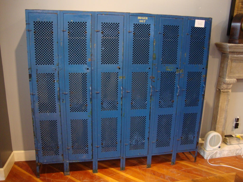 Unusual set of gym lockers in original blue paint. Six compartments with mesh like venting. Great detail in handles and hinges. Found in Chicago