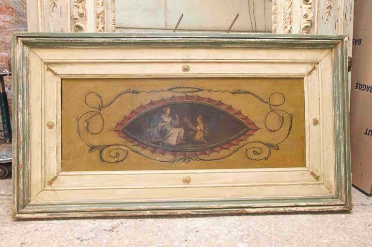 18 th French oil on canvas featuring an elegant and bucolic scene with two characters from the countryside and framed in an antique boiserie
