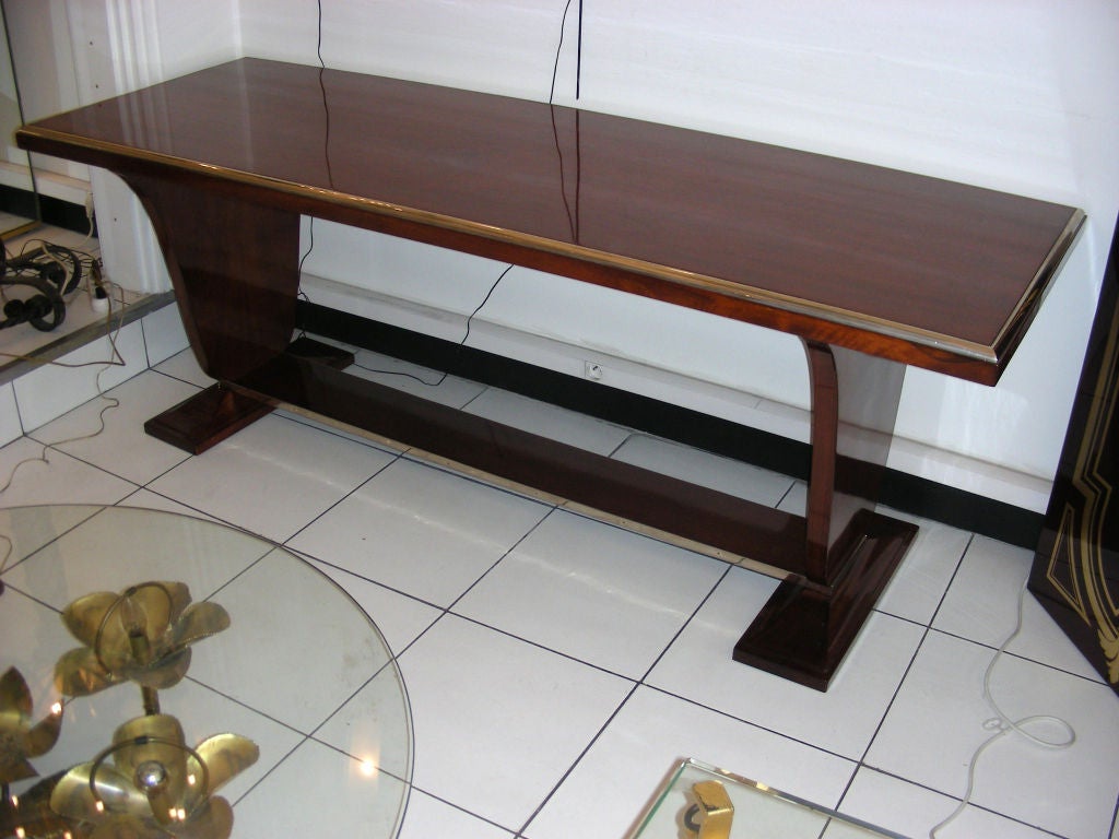Consol table in walnut tree and details in metal
